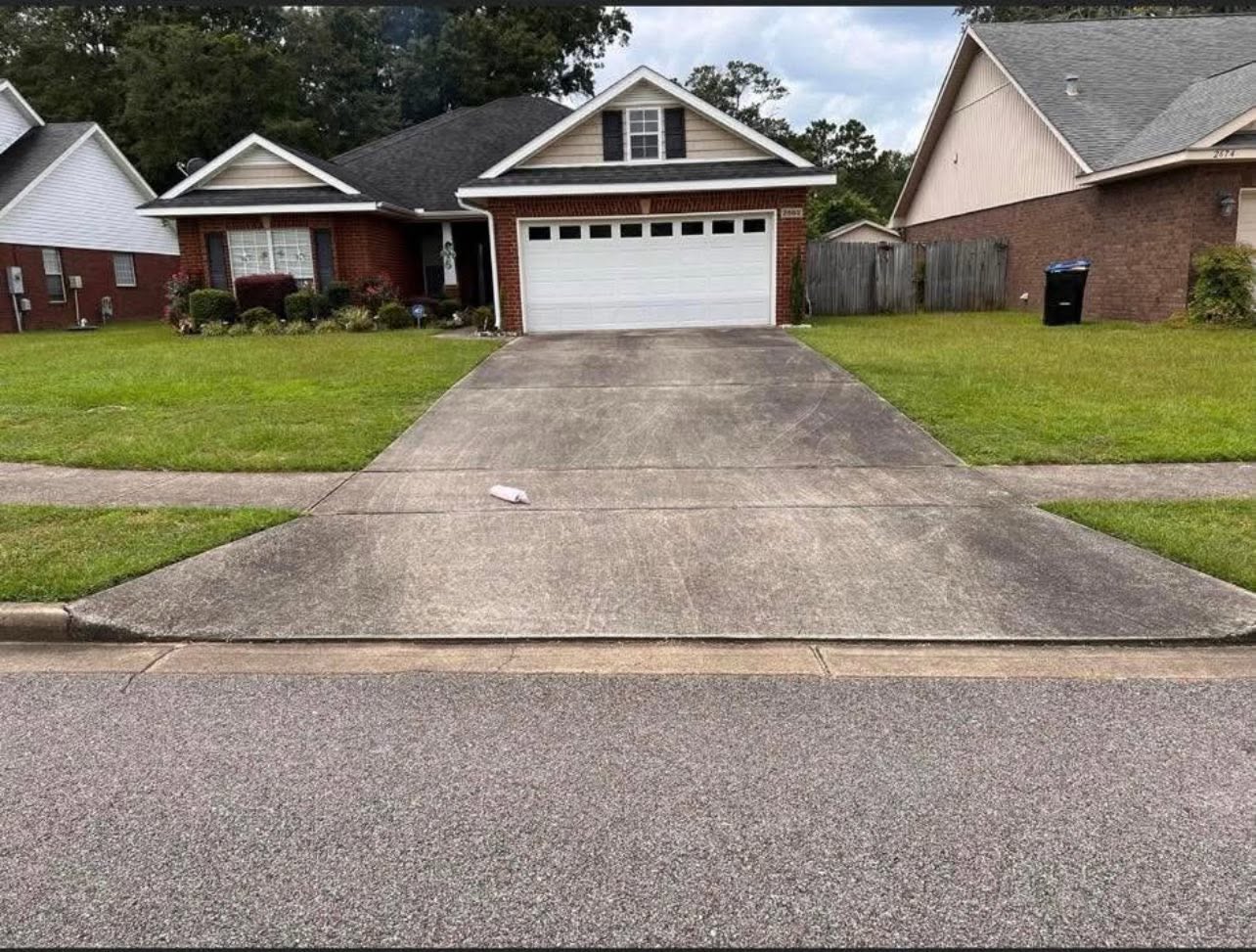 Residential driveway cleaned by Pats Pressure
